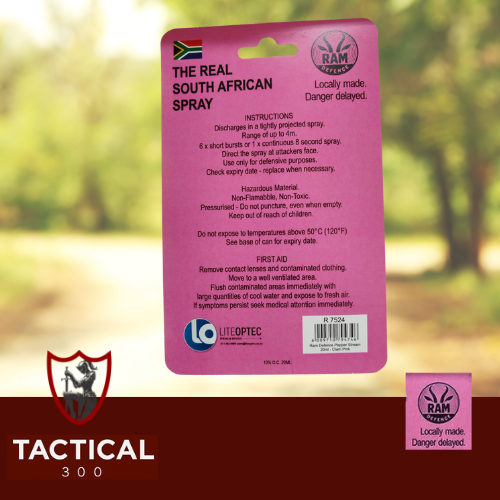 Compact 20 ml RAM Defense Pepper Stream canister (pink / blue) with key-chain loop — handheld OC pepper spray for self-defence, shown on plain background.