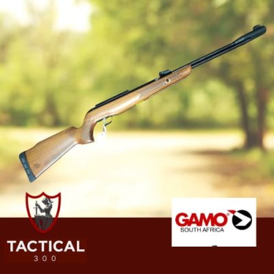 Gamo CFX Royal 5.5mm underlever air rifle with hardwood stock and fixed barrel, displayed in store with product tag.