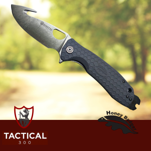 Beretta x Honey Badger Cross-Bolt Drop-Point Medium/Large folding knife with blue honeycomb-textured handle, stainless steel drop-point blade, integrated choke key feature, and Beretta 500-year commemorative branding.